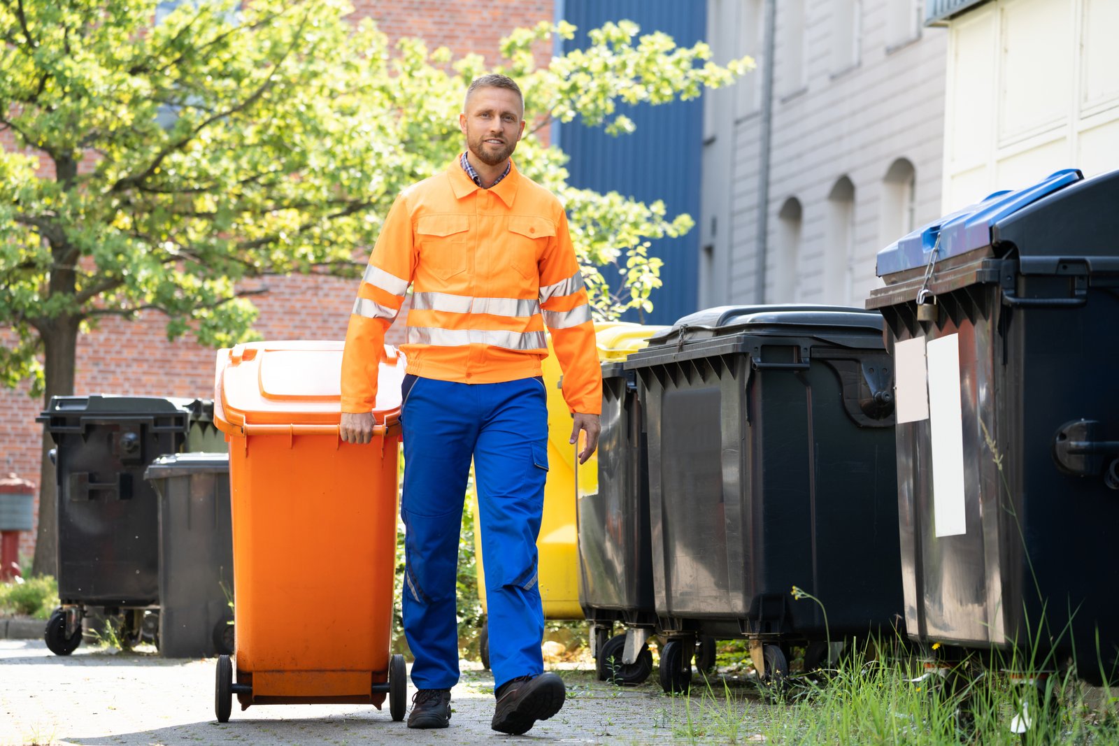 Garbage Removal Man Doing Trash And Rubbish Collection